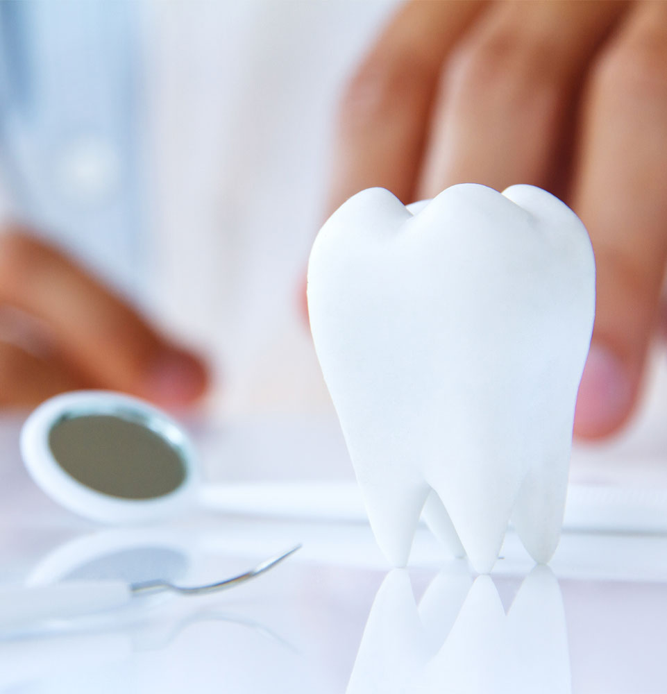 photo placeholder with white tooth and dental tools